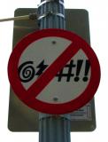 Symbols - to look like censored profanity - inside a 'no' or 'not allowed' sign