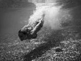 Woman diving underwater